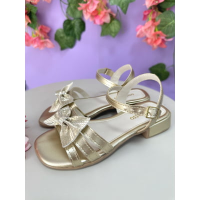 Sandália Infantil de Tiras Dourado Com Laço e Glitter Luxo